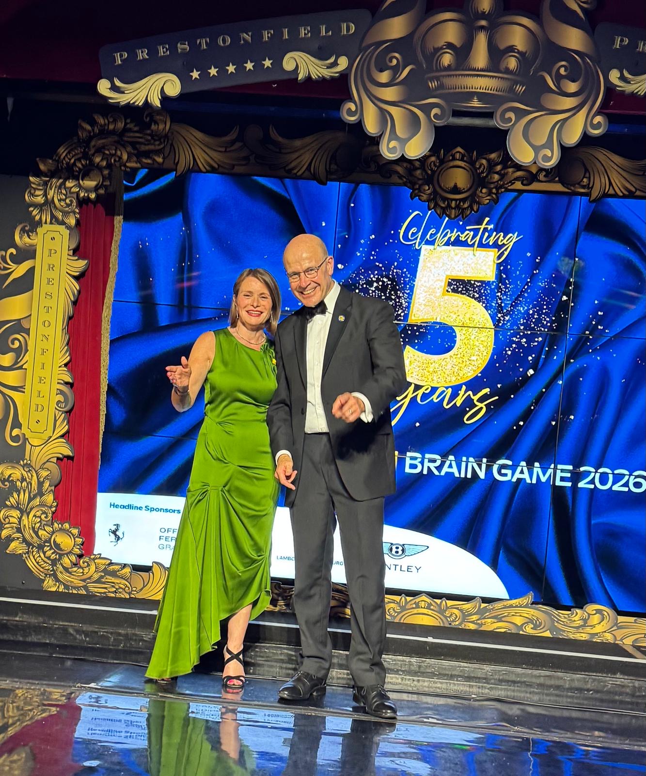 Justine on stage at the Marie Curie Brain Game